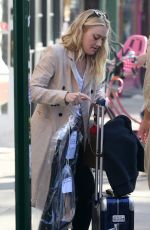 DAKOTA FANNING Leaves Her Hotel in New York 10/12/2016