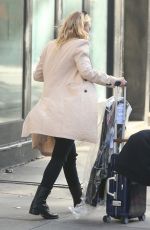 DAKOTA FANNING Leaves Her Hotel in New York 10/12/2016