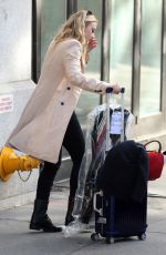 DAKOTA FANNING Leaves Her Hotel in New York 10/12/2016