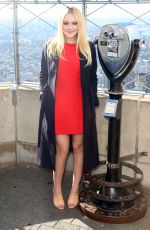 DAKOTA FANNING Lights The Empire State Building in New York 10/11/2016