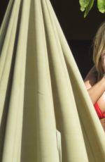 DANIELLE ARMSTRONG in Bikini at a Pool in Malaga 10/03/2016