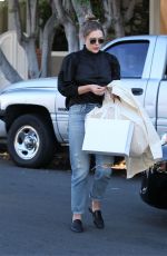 ELIZABETH OLSEN Out Shopping on Melrose Place in Los Angeles 10/28/2016