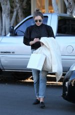 ELIZABETH OLSEN Out Shopping on Melrose Place in Los Angeles 10/28/2016