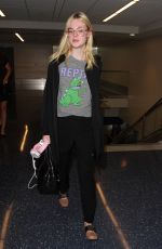 ELLE FANNING at Los Angeles international Airport 10/06/2016