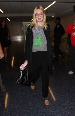 ELLE FANNING at Los Angeles international Airport 10/06/2016