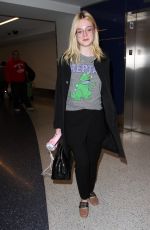 ELLE FANNING at Los Angeles international Airport 10/06/2016