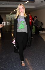 ELLE FANNING at Los Angeles international Airport 10/06/2016