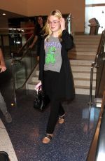 ELLE FANNING at Los Angeles international Airport 10/06/2016