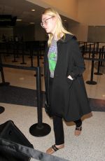 ELLE FANNING at Los Angeles international Airport 10/06/2016