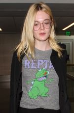 ELLE FANNING at Los Angeles international Airport 10/06/2016