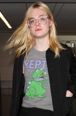 ELLE FANNING at Los Angeles international Airport 10/06/2016
