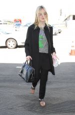 ELLE FANNING at Los Angeles international Airport 10/06/2016