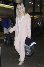 ELLE FANNING at Los Angeles International Airport 10/11/2016