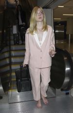 ELLE FANNING at Los Angeles International Airport 10/11/2016