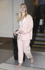 ELLE FANNING at Los Angeles International Airport 10/11/2016