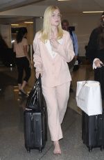 ELLE FANNING at Los Angeles International Airport 10/11/2016
