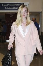 ELLE FANNING at Los Angeles International Airport 10/11/2016