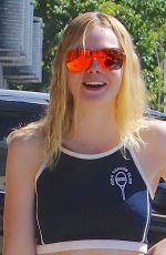 ELLE FANNING in Plaid Skirt Out in Beverly Hills 09/30/2016