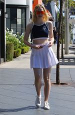 ELLE FANNING in Plaid Skirt Out in Beverly Hills 09/30/2016