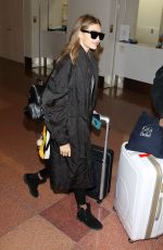 GIGI HADID Arrives in Tokyo 10/11/2016