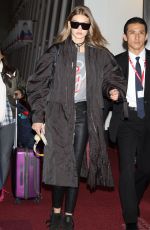 GIGI HADID Arrives in Tokyo 10/11/2016