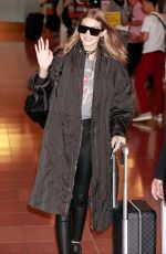 GIGI HADID Arrives in Tokyo 10/11/2016