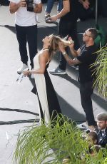 JENNIFER ANISTON on Set of a Smart Water Photoshoot in Los Angeles 10/18/2016