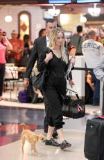 JENNIFER LAWRENCE with Her Dog at JFK Airport in New York 10/29/2016