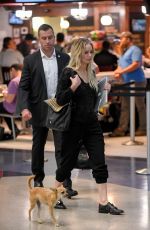 JENNIFER LAWRENCE with Her Dog at JFK Airport in New York 10/29/2016