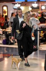JENNIFER LAWRENCE with Her Dog at JFK Airport in New York 10/29/2016