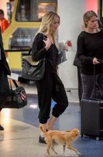 JENNIFER LAWRENCE with Her Dog at JFK Airport in New York 10/29/2016