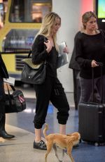 JENNIFER LAWRENCE with Her Dog at JFK Airport in New York 10/29/2016