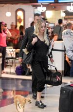JENNIFER LAWRENCE with Her Dog at JFK Airport in New York 10/29/2016