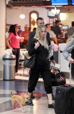 JENNIFER LAWRENCE with Her Dog at JFK Airport in New York 10/29/2016