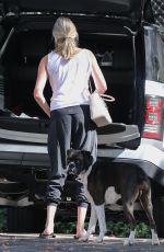 KATE UPTON Walks Her Dog Harley Out in Beverly Hills 10/12/2016