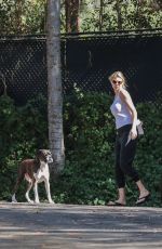 KATE UPTON Walks Her Dog Harley Out in Beverly Hills 10/12/2016