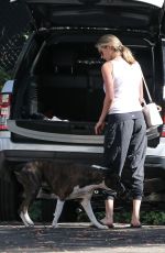 KATE UPTON Walks Her Dog Harley Out in Beverly Hills 10/12/2016