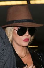 KHLOE KARDASHIAN in Ripped Jeans at LAX Airport in Los Angeles 10/20/2016