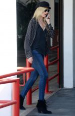 KIMBERLY STEWART Picks Up Her Dry Cleaning in West Hollywood 10/04/2016