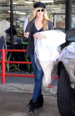 KIMBERLY STEWART Picks Up Her Dry Cleaning in West Hollywood 10/04/2016