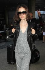 LILY COLLINS at Los Angeles International Airport 10/03/2016