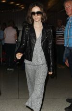 LILY COLLINS at Los Angeles International Airport 10/03/2016