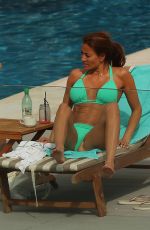 MELANIE SYKES in Bikini at a Pool in Ibiza 10/13/2016