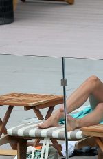 MELANIE SYKES in Bikini at Her Hotel Pool in Ibiza 10/17/2016