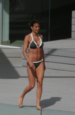 MELANIE SYKES in Bikini at Her Hotel Pool in Ibiza 10/17/2016