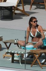 MELANIE SYKES in Bikini at Her Hotel Pool in Ibiza 10/17/2016