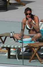 MELANIE SYKES in Bikini at Her Hotel Pool in Ibiza 10/17/2016