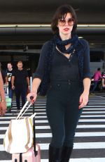 MILLA JOVOVICH at Los Angeles international Airport 10/02/2016