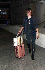 MILLA JOVOVICH at Los Angeles international Airport 10/02/2016