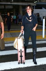 MILLA JOVOVICH at Los Angeles international Airport 10/02/2016